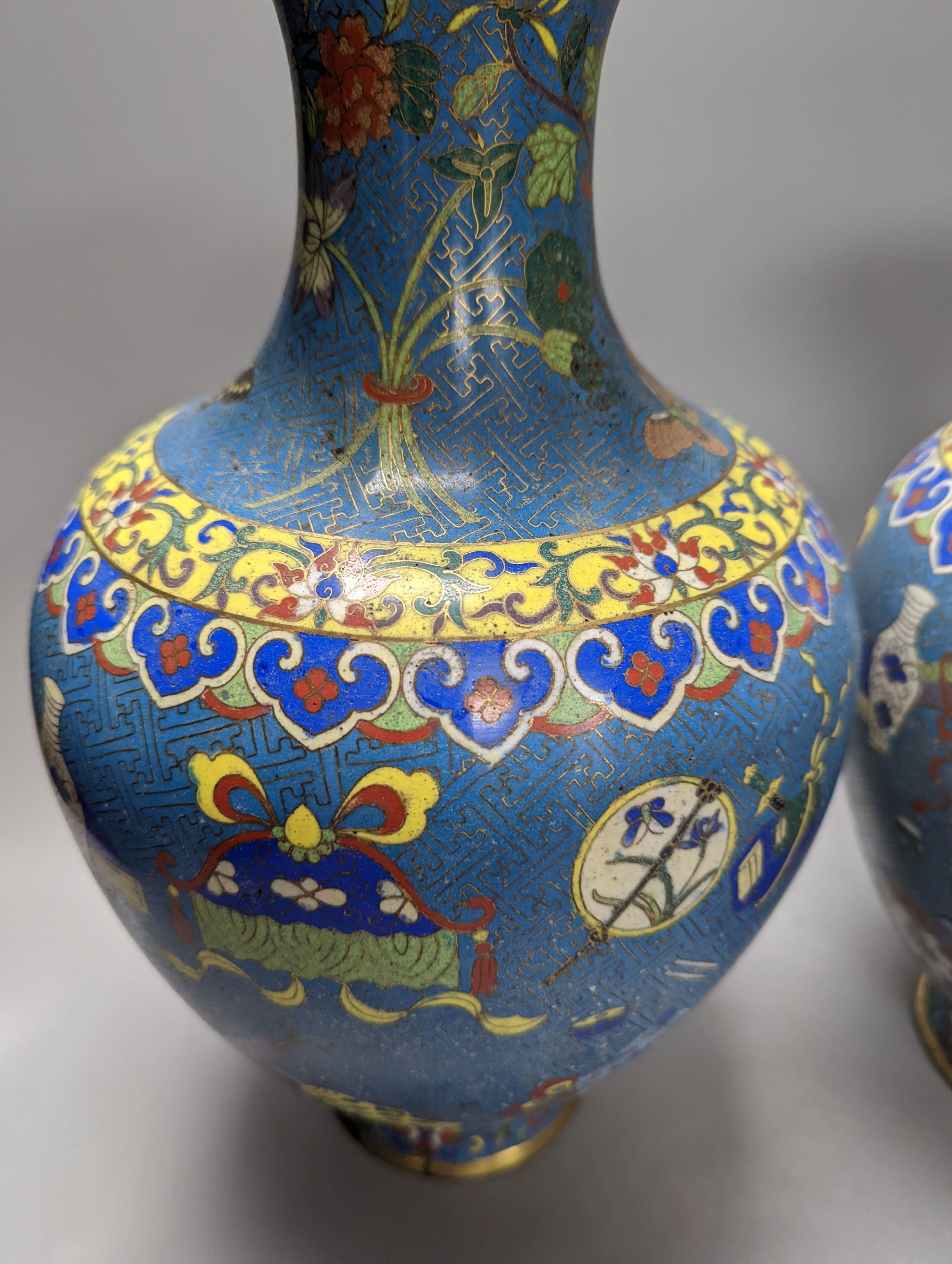 A pair of late 19th/early 20th century Chinese cloisonné enamel ‘Buddhist emblems’ vases 36cm
